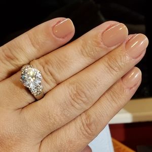 4.66TCW platinum over sterling silver setting